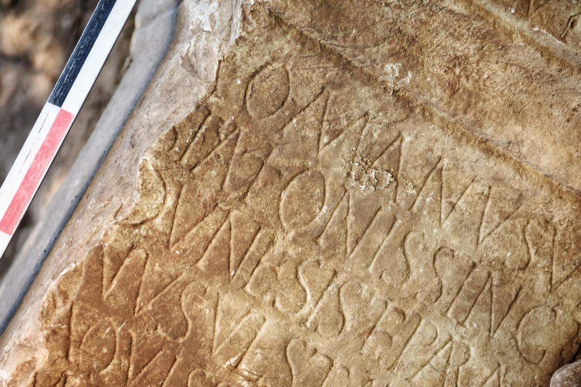 Roman lettering showed the wall stone was once an altar.