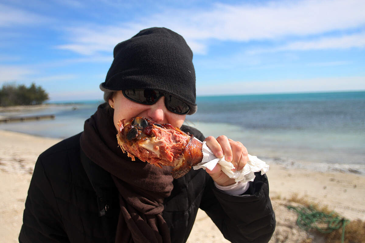 Knights, lords and ladies came out in costume for the Florida Renaissance Festival at Virginia Key Beach Park on Sunday, Jan. 10, 2010. Pictured, Gabriela Oliwkowicz (cq) enjoys a turkey leg on the beach.