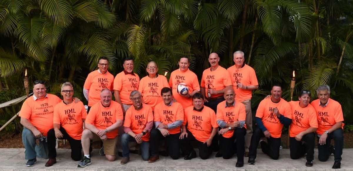 The 1977-78 Champion Hialeah-Miami Lakes Sr. High School soccer players line up for a picture in their reunion shirts in the same order as the original State Championship team picture. Their coach, Jose Enriquez, thanked them for the great memories.