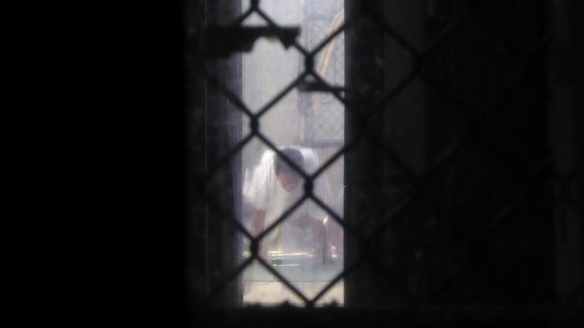 A captive at Guantánamo's Camp 6 prison at Ramadan prayer on Wednesday June 6, 2018 in a photo approved for release by a member of the U.S. military at Guantánamo.