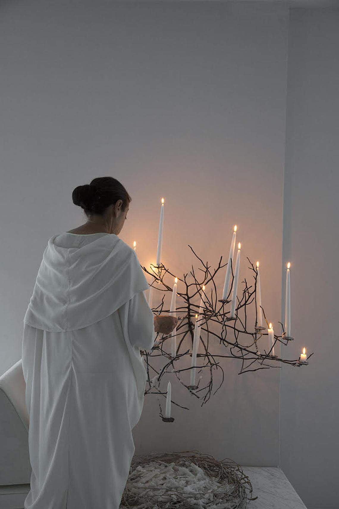 Artist Michele Oka Doner lighting her work ‘Burning Bush,’ which she previously had on display in her Miami Beach home but now has for sale at Design Miami.