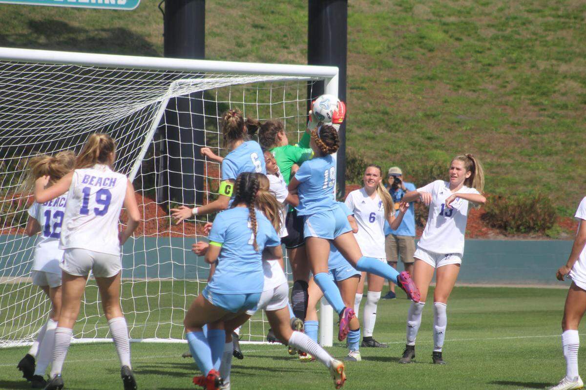 Lourdes has one of several scoring opportunities thwarted by Fletcher goalkeeper Taylor Sweat during its Class 6A girls soccer state championship match at Spec Martin Stadium.