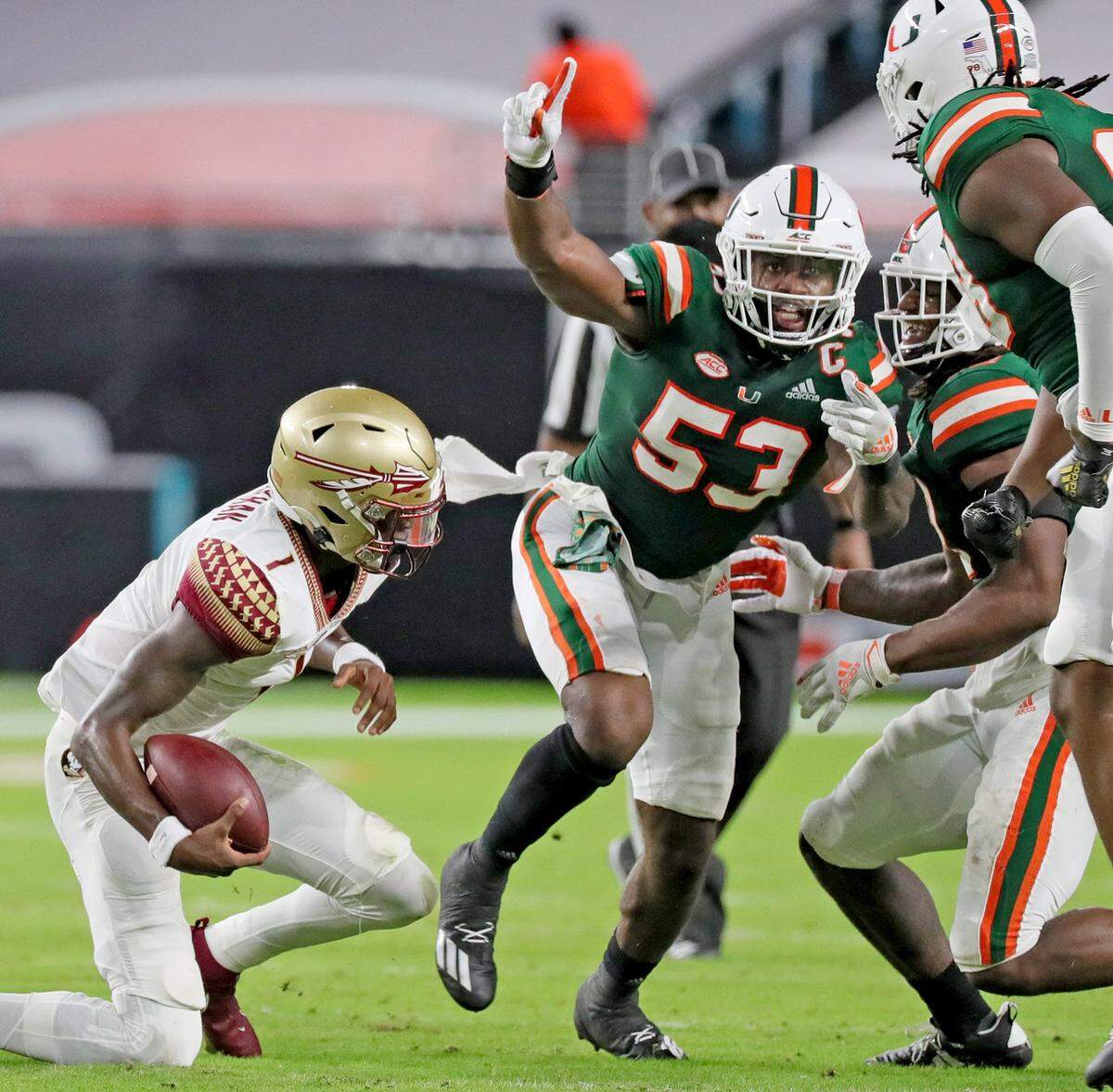 UM’s linebacker Zach McCloud (53) celebrates a second quarter tackle on FSU quarterback James Blackman (1) during the UM-FSU game on Sept. 26. That game was on ABC, but the next two UM games will be on ACC Network.
