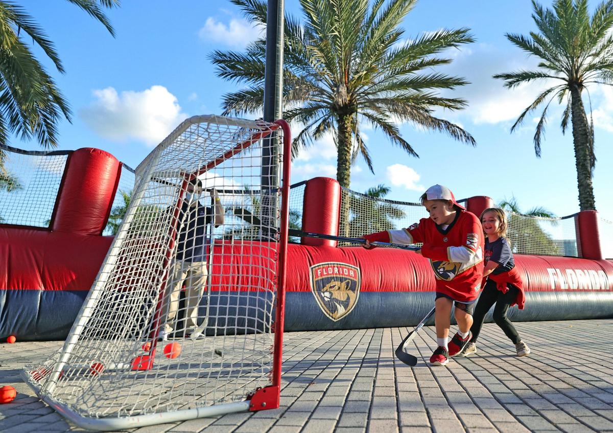 Kids playing as part of the fan experience activities before the Florida Panthers NHL home opener game against the Pittsburgh Penguins at the FLA Live Arena on Oct. 14, 2021 in Sunrise.