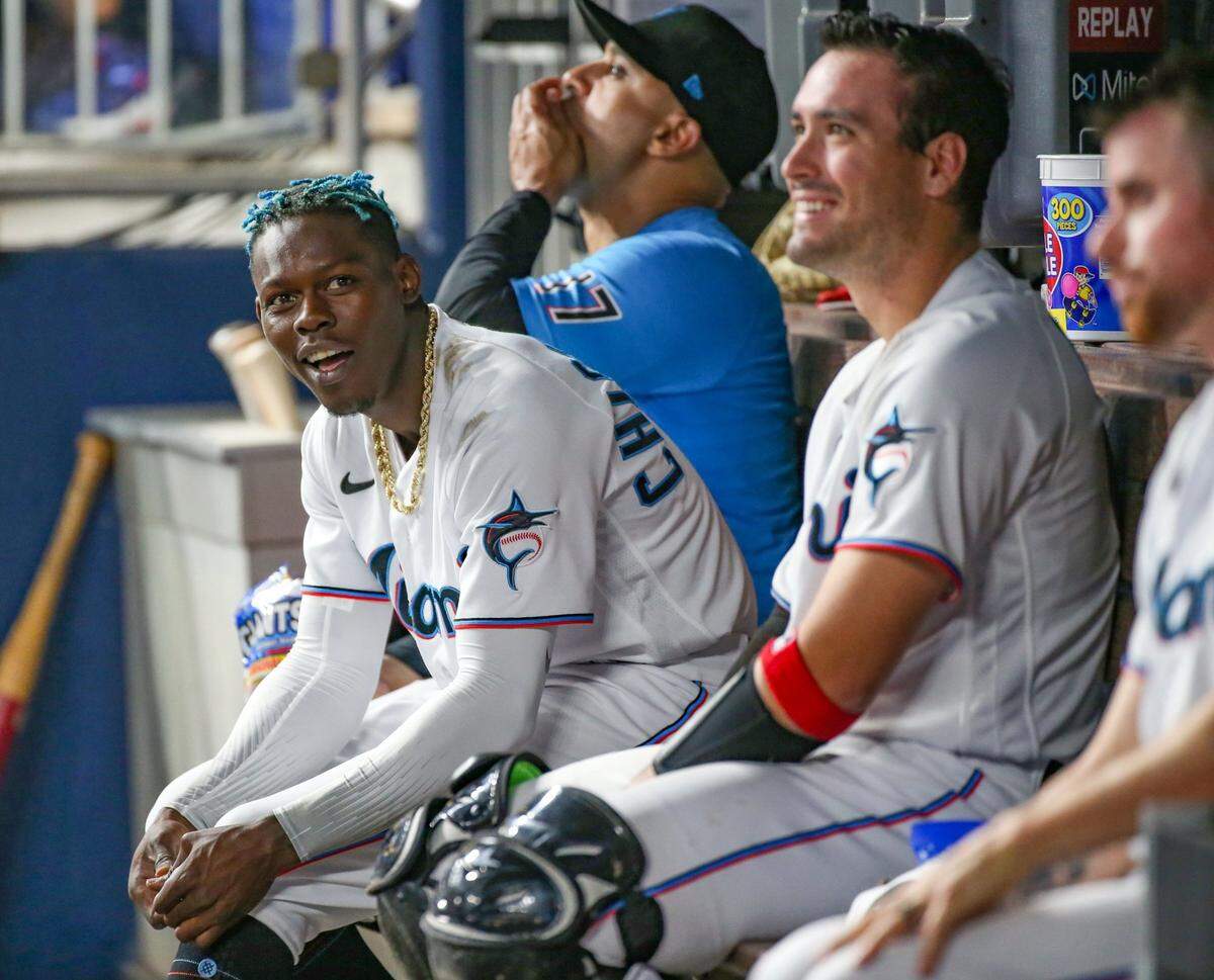 Miami Marlins second baseman Jazz Chisholm Jr. (2) in the dugout with teammates during game against the Washington Nationals at loanDepot park in Miami on Tuesday, June 7, 2022.