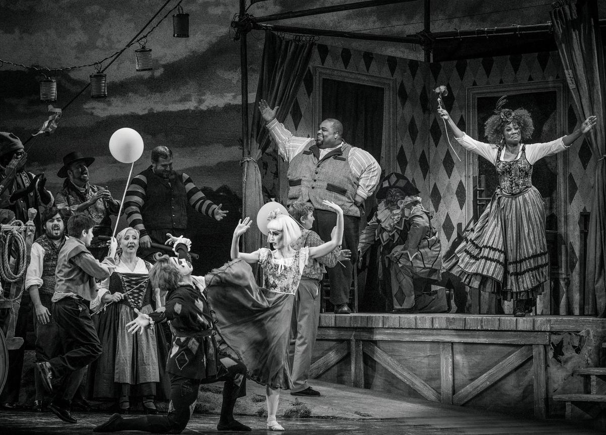 Limmie Pulliam, upper left, and Kearstin Piper Brown, upper right, perform the opening scene of Florida Grand Opera’s production of ‘I pagliacci’ at the Adrienne Arsht Center in Miami.