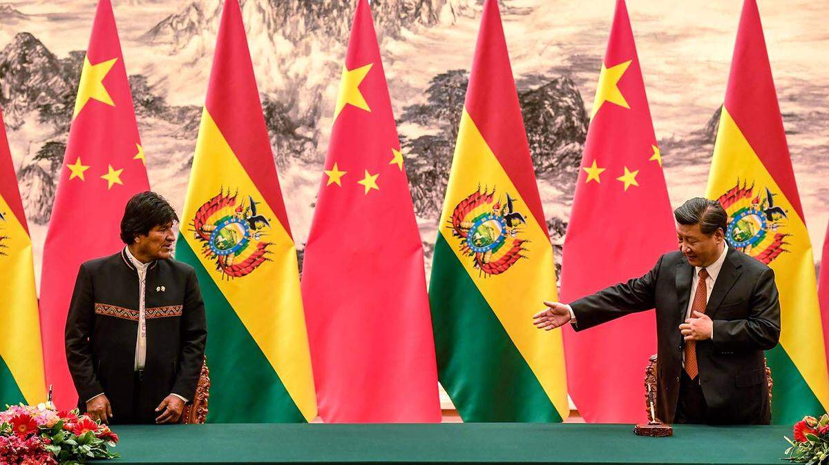 In 2018, Chinese President Xi Jinping, right, seeking greater business opportunities in Latin America, hosts Bolivia’s President Evo Morales at the Great Hall of the People in Beijing.