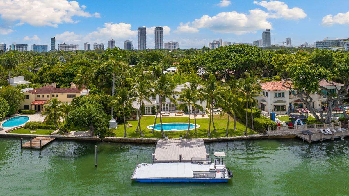 J. Christopher Burch has put his Miami Beach waterfront mansion, pictured here with the dock, for $49 million. Courtesy of ONE Sotheby’s International Realty.