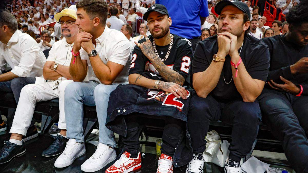 Brazilian soccer player Neymar poses as he is photographed during Game 3 of the NBA Finals between the Miami Heat and the Denver Nuggets at the Kaseya Center on Wednesday, June 7, 2023, in Miami, Fla.