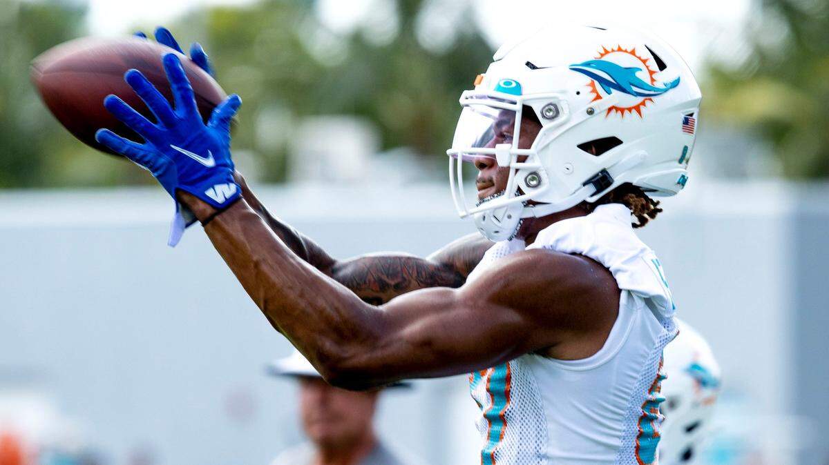 Miami Dolphins wide receiver Erik Ezukanma (87) catches the ball during Dolphins training camp at Baptist Health Training Complex in Miami Gardens on Monday, August 1, 2022.