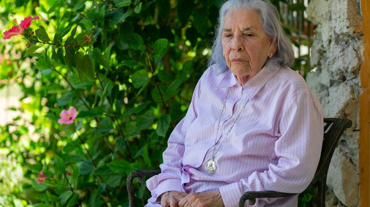 Ana Lazara Rodriguez, 82, sits outside of her home before holding a press conference in Miami, Florida, on Thursday, May 6, 2021, to bring attention to her case.