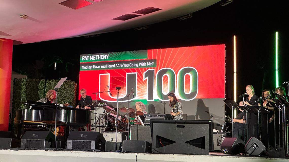University of Miami alums Pat Metheny (guitar, far left behind piano) and bassist Will Lee (left) perform at the University of Miami’s U 100 Centennial Celebration on the Lakeside Patio stage on the Coral Gables campus on April 8, 2025.