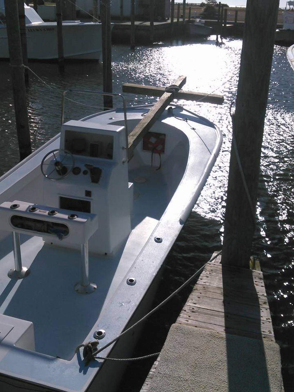 Capt. Aaron Aaron put the cross he built as a memorial to friend Rich Baran on board his boat to transport it to an island in North Carolina after Baran disappeared in January 2016.