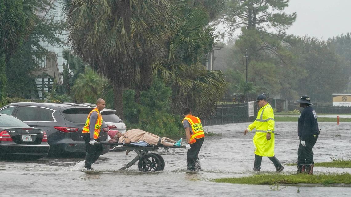 Authorities transport a person out of the Avante nursing home in the aftermath of Hurricane Ian, Thursday, Sept. 29, 2022, in Orlando, Fla. Hurricane Ian carved a path of destruction across Florida, trapping people in flooded homes, cutting off the only bridge to a barrier island, destroying a historic waterfront pier and knocking out power to 2.5 million people as it dumped rain over a huge area on Thursday. 