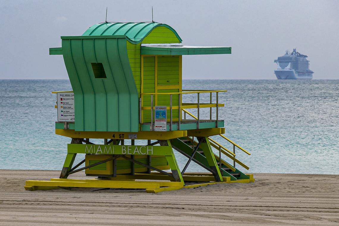 A cruise ship can be seen out in the water near Miami Beach on Wednesday, April 1, 2020. Cruise ships have been lingering off South Florida’s coast and cycling in and out of PortMiami and Port Everglades after the cruise industry shut down on March 13.
