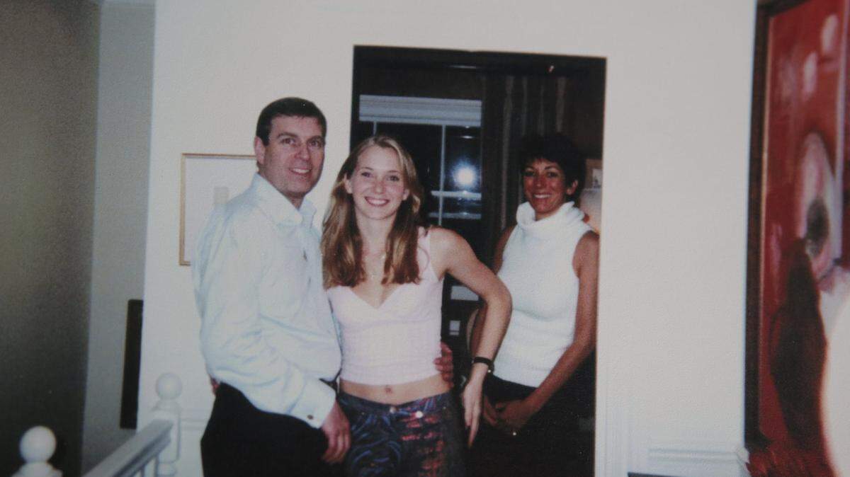 The photo at the center of the scandal: Virginia Roberts, now Giuffre socializes with Prince Andrew in the company of Jeffrey Epstein associate Ghislaine Maxwell.