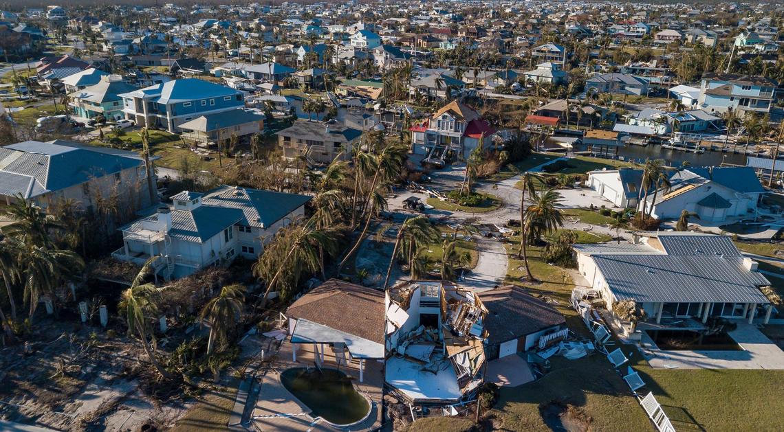 An aerial view of hurricane damage on the southern tip of St. James City on Friday, Sept. 30, 2022, in Pine Island, Florida. Hurricane Ian made landfall on the coast of Southwest Florida as a Category 4 storm Wednesday afternoon, leaving areas affected with flooded streets, downed trees and scattered debris.