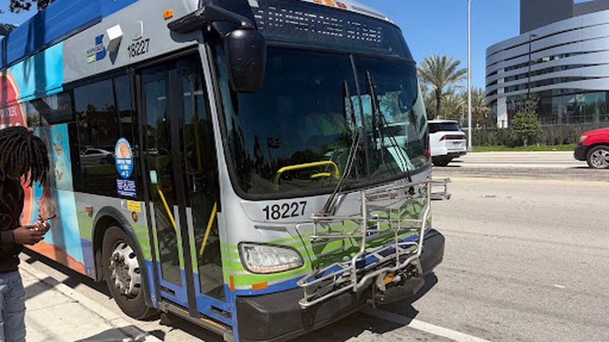 A Route 3 bus arrives at Biscayne Boulevard and Northeast 151st Street.
