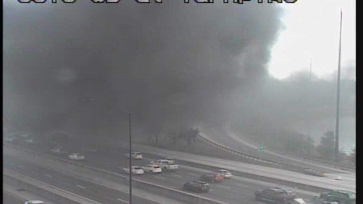 The smoke from the overturned tanker Sunday afternoon at Interstate 595 and the Florida Turnpike