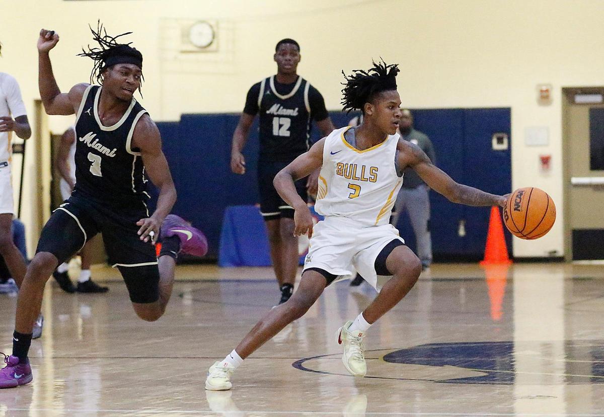 Northwestern Isaisah McKenny Jr. (3) controls the ball during the GMAC Boy’s championship basketball game against Miami Senior High on Saturday, January 25, 2025 at Miami Senior HS in Miami. Andrew Uloza / for Miami Herald