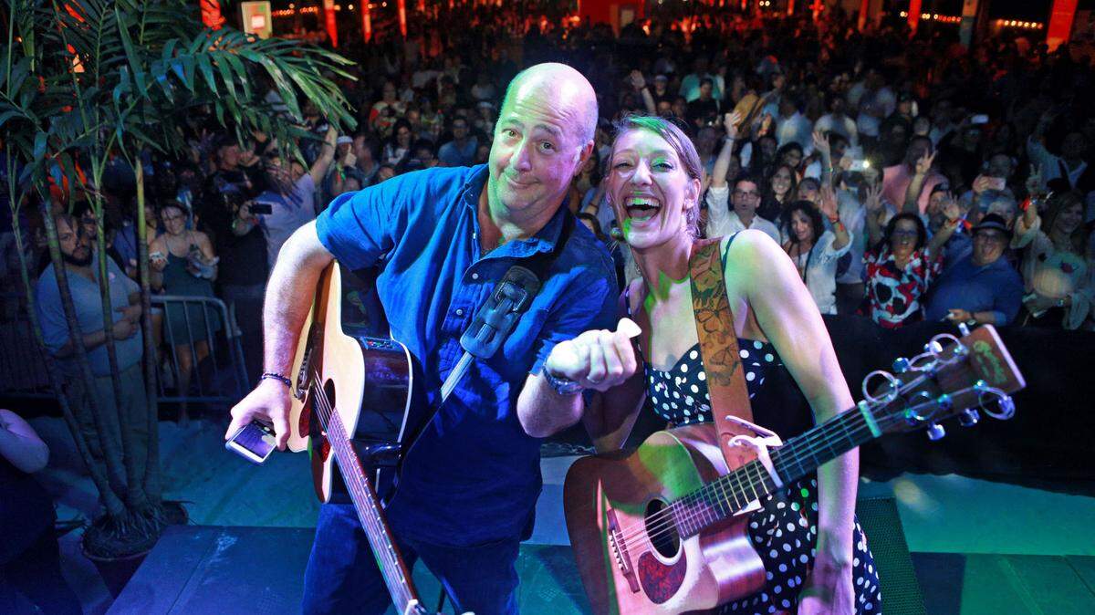 Andrew Zimmern, pictured with Carly Jo Jackson, hosts a beachside bash to close the South Beach Wine & Food Festival, an event for which tickets are still available.