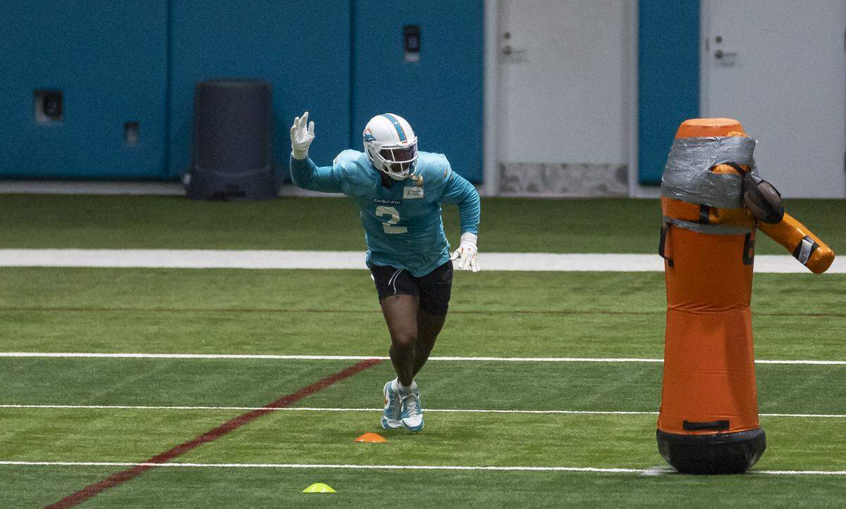 Miami Dolphins linebacker Bradley Chubb (2) runs a drill during a team practice session at the Baptist Health Training Complex on Wednesday, Sept. 10, 2025, in Miami Gardens, Fla.