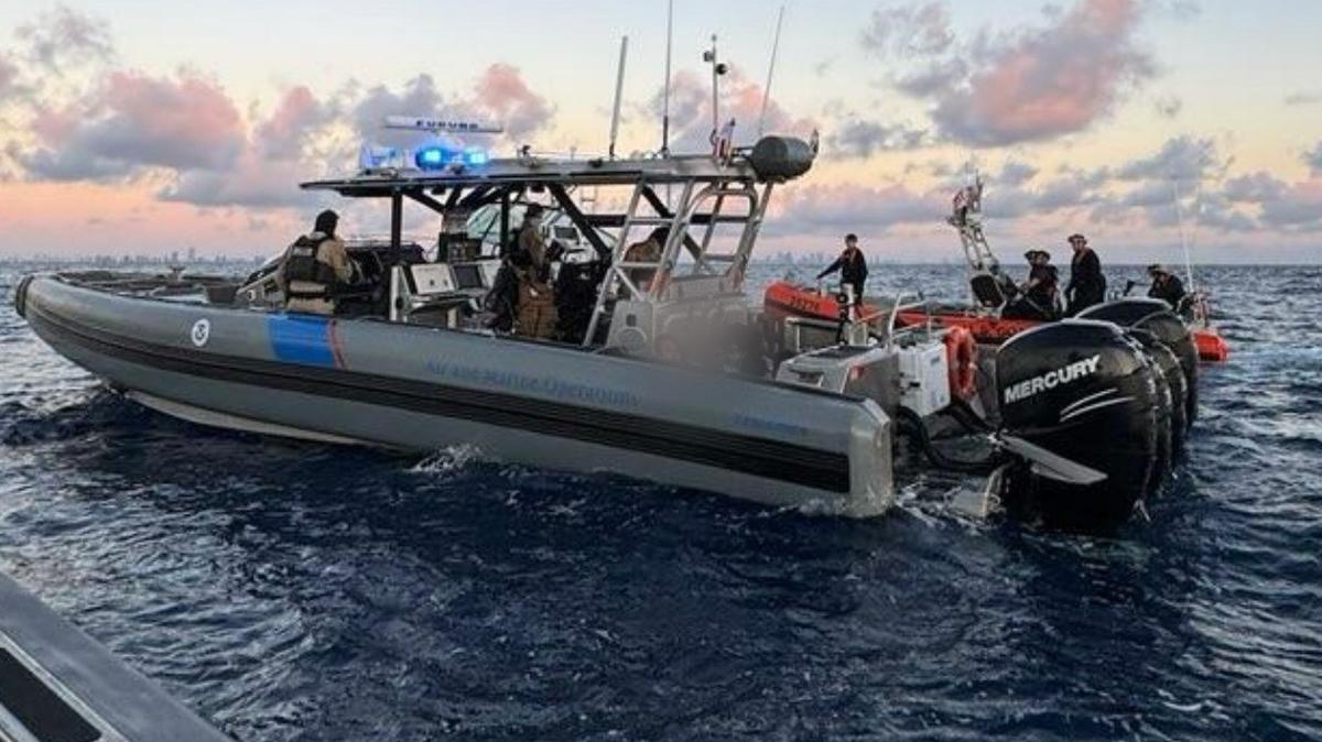 Customs and Border Protection Air and Marine Operations and Coast Guard boat crews stop a suspected migrant smuggling boat in U.S. waters off South Florida Sunday, Feb. 9, 2025. The interception was one in a series of recent migrant smuggling stops in between the Bahamas and South Florida in recent months.