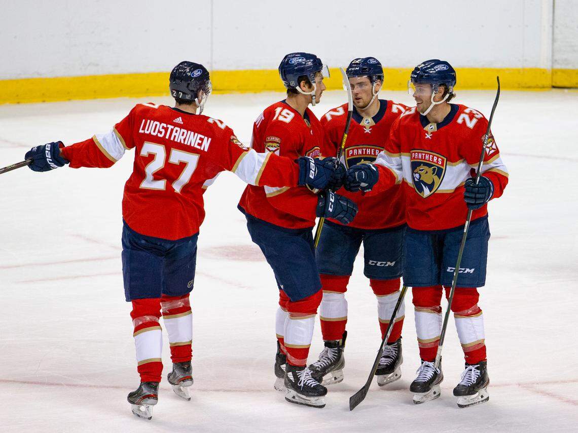 Florida Panthers center Carter Verhaeghe (23) is congratulated by teammates after scoring during the first period of the first training camp scrimmage in preparation for the 2021 NHL season at the BB&T Center on Thursday, January 7, 2021 in Sunrise.