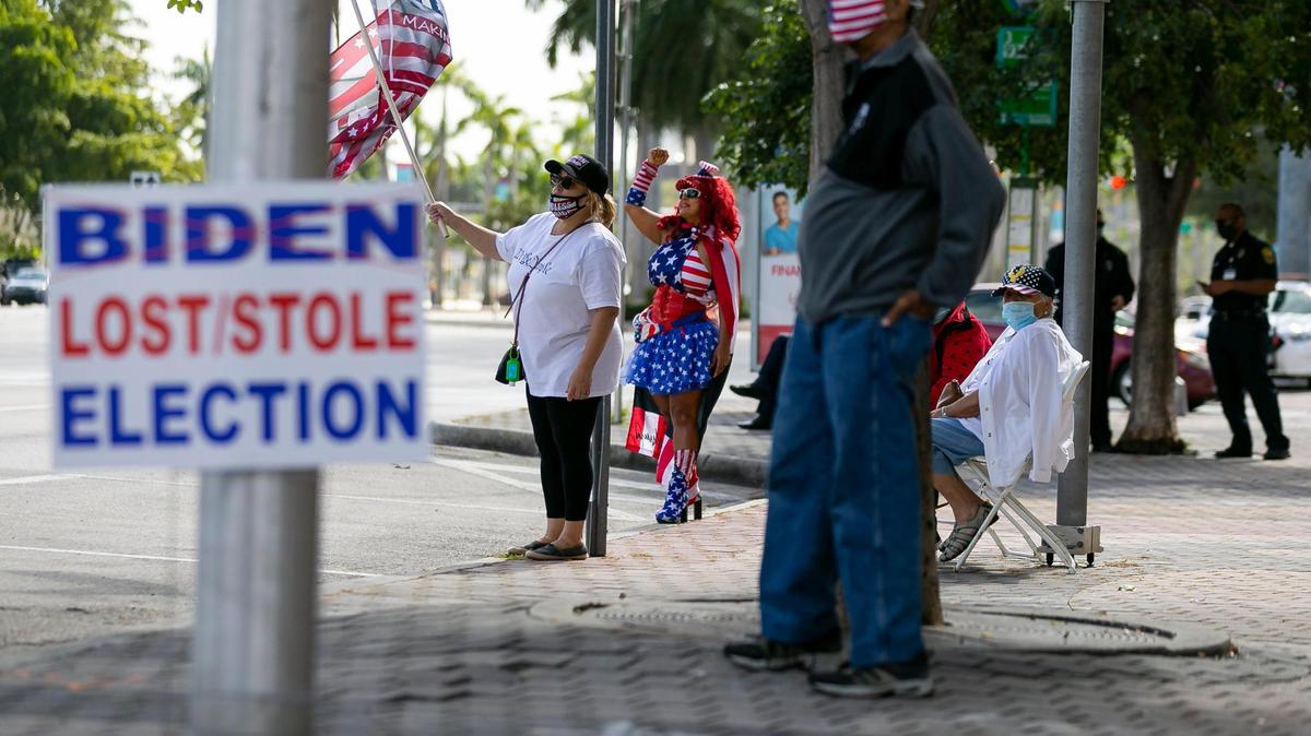 Supporters of President Donald Trump attend a protest at the Freedom Tower in downtown Miami on Saturday, Jan. 16, 2021.