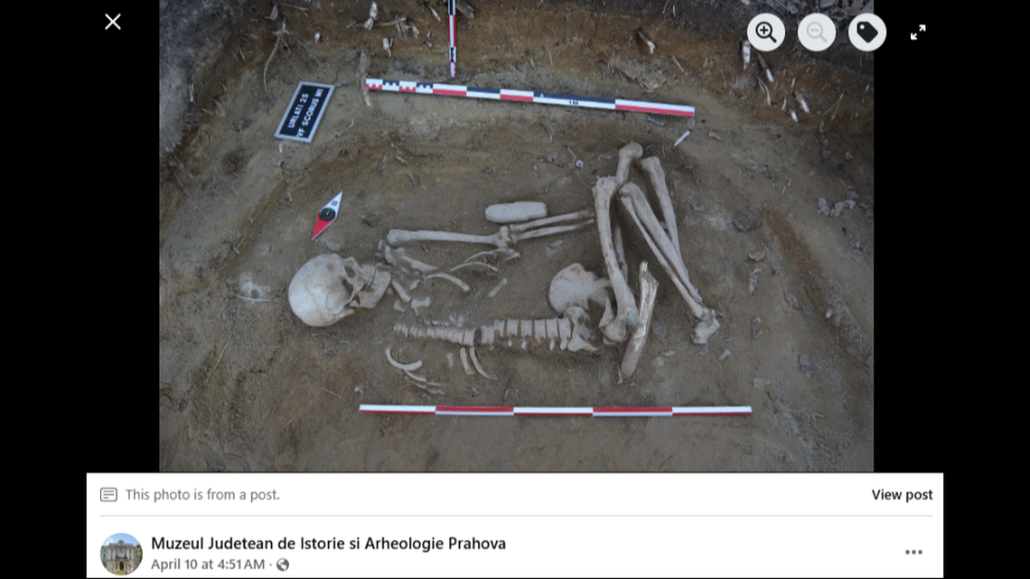 An 8-inch-long stone piece found next to the body may have been an ax during the early Bronze Age, archaeologists said.