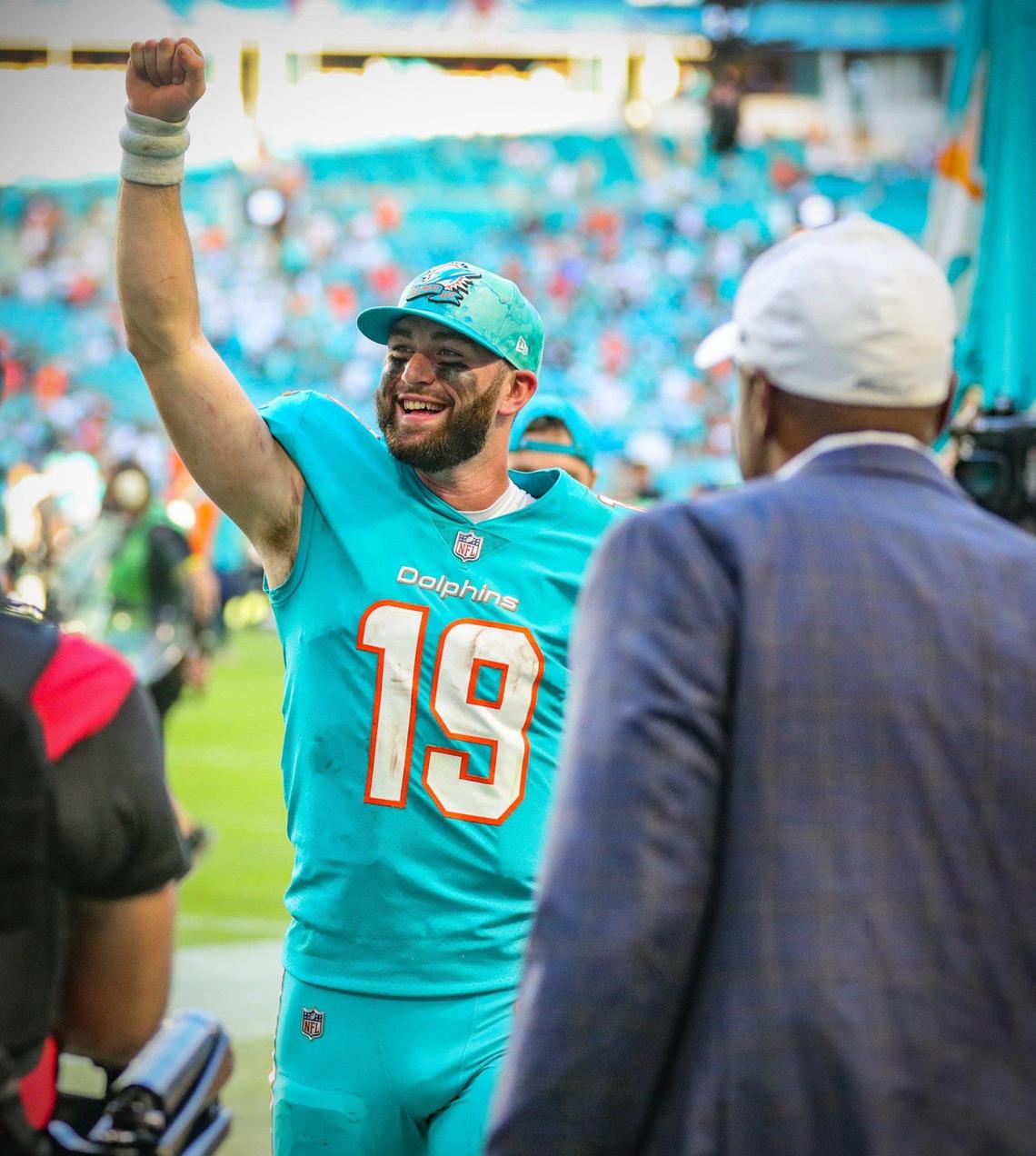 Miami Dolphins quarterback Skylar Thompson (19) pumps his fist in celebration after the Dolphins defeat the New York Jets at Hard Rock Stadium in Miami Gardens on Sunday, January 8, 2023.