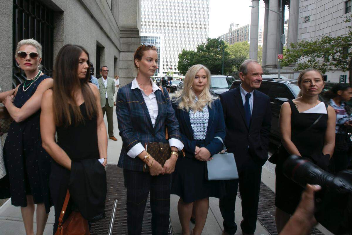 Attorney David Boies (second from right) walks with some of Jeffrey Epstein’s alleged sexual abuse victims, including Virginia Roberts Giuffre (left of Boies) as they enter the Thurgood Marshall United States Courthouse in New York City on Tuesday, Aug. 27, 2019, for a special hearing.