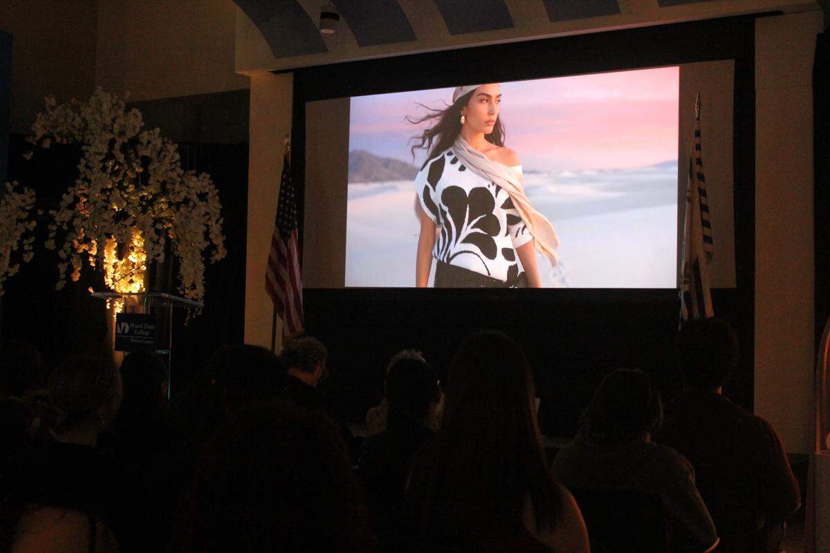 Guests at the Miami Fashion Week Virtual Fashion Awards pre-gala screening watch an AI model at Miami Dade College’s Wolfson Campus on May 19th, 2026.