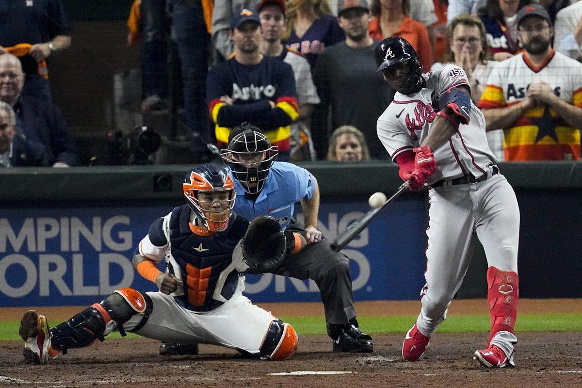 Atlanta Braves’ Jorge Soler hits a three-run home run during the third inning in Game 6 of baseball’s World Series between the Houston Astros and the Atlanta Braves Tuesday, Nov. 2, 2021, in Houston. (AP Photo/Sue Ogrocki)
