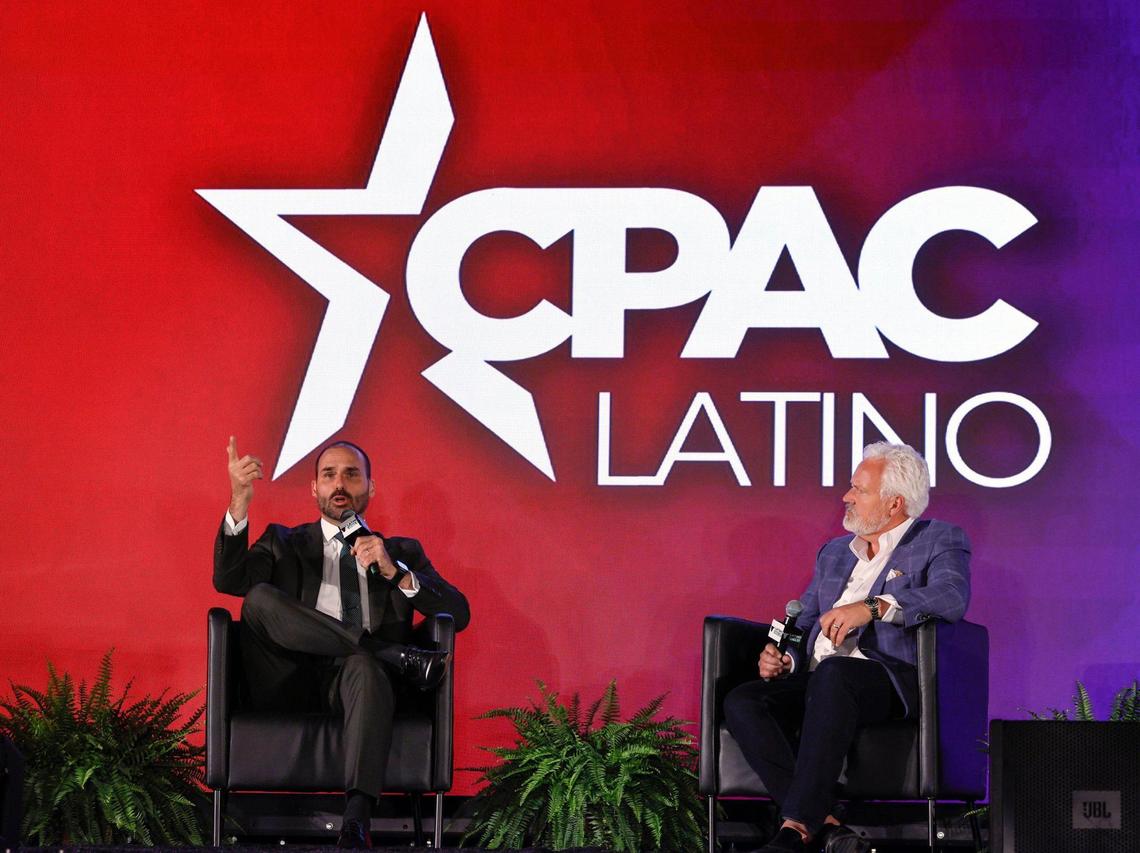 Eduardo Bolsonaro, Brazilian lawyer, activist and politician, speaks as CPAC Chairman & former White House political director Matt Schlapp listens during CPAC Latino 2025 at Seminole Hard Rock Hotel & Casino Hollywood, Florida, on Saturday, June 28, 2025.