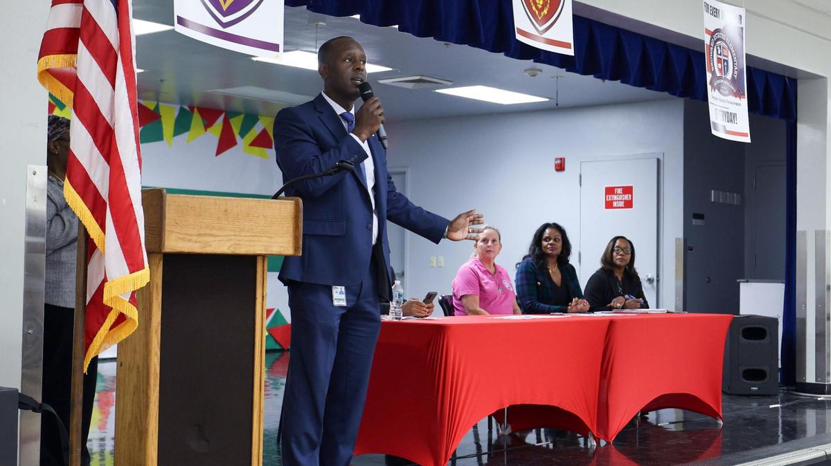 Superintendent of Broward schools, Howard Hepburn, addresses the residents, activists, and community members of Lauderhill as they convened at Broward Estates Elementary School. The school is set to be converted into an early learning center.