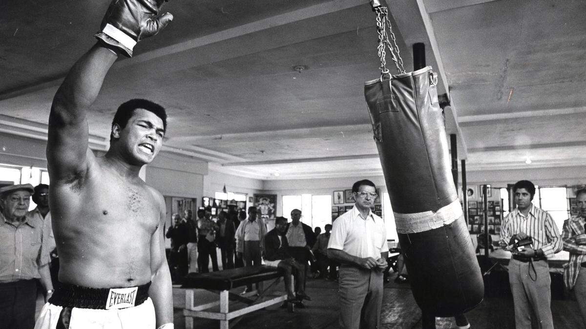 Muhammad Ali with Angelo Dundee at left