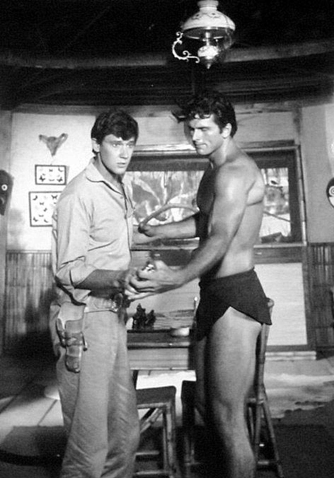 Photo from the television program “Tarzan.” In photo are Ron Ely (Tarzan) and Andrew Prine. Photo is in Public Domain