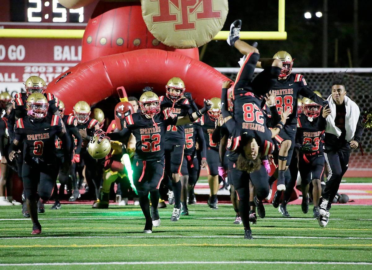 Monsignor Pace Spartans take the field for a game against North Miami Beach Charges on Friday, October 25, 2024 at Monsignor HS in Miami. Andrew Uloza / for Miami Herald