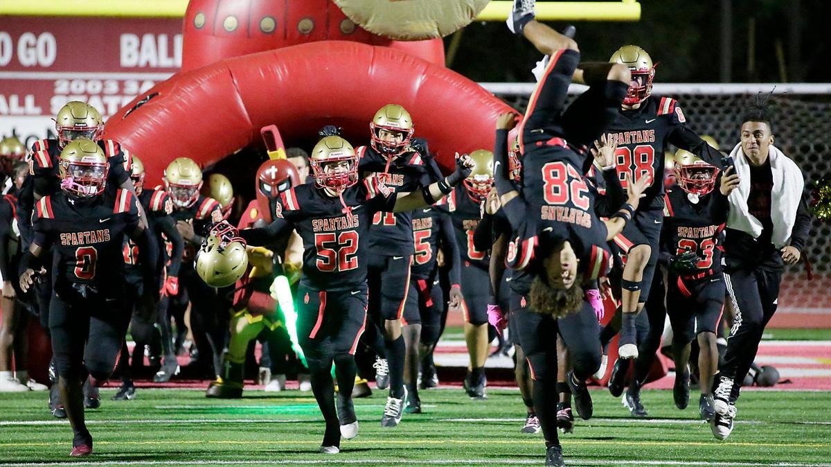 Monsignor Pace Spartans take the field for a game against the North Miami Beach Chargers on Friday, October 25, 2024 at Monsignor Pace HS in Miami.
