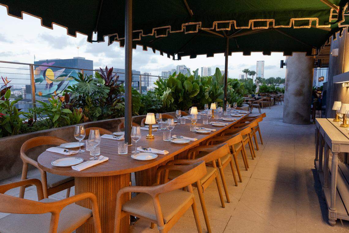 A long table at La Ferneteria rooftop restaurant and bar in Wynwood.
