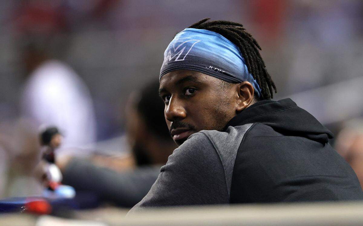 Miami Marlins right fielder Lewis Brinson (25) looks on during the seventh inning of their baseball game against the Cincinnati Reds at loanDepot park on Sunday, August 29, 2021 in Miami, Florida.
