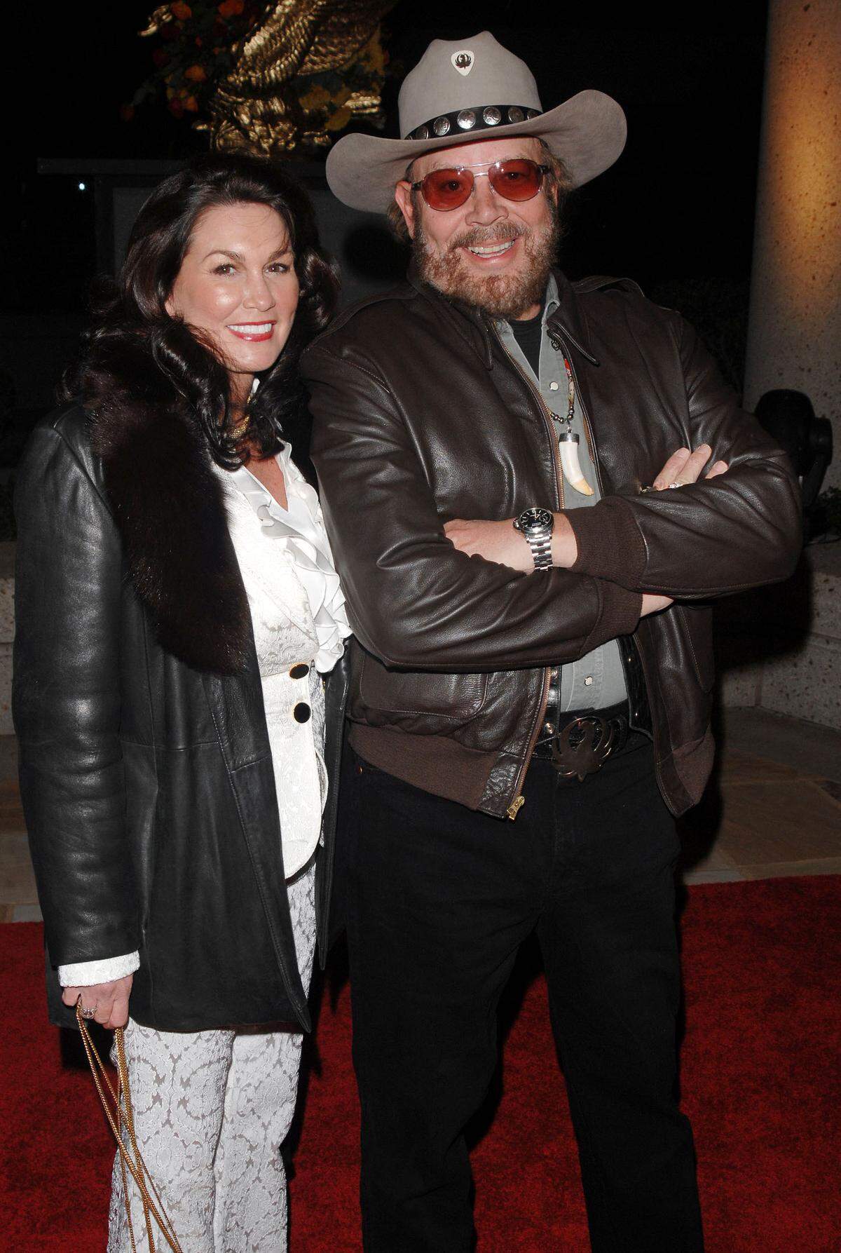 Hank Williams Jr. and his wife Mary Jane Thomas arrive at the 2008 BMI Country Awards, in Nashville, Tennessee on Nov. 11, 2008. Mary Jane died in Jupiter, Florida, on March 22, 2022.