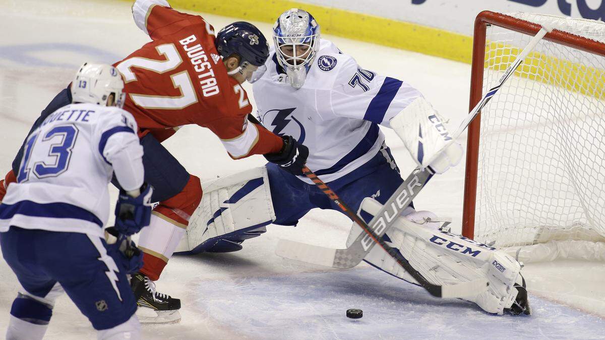 Tampa Bay Lightning goaltender Louis Domingue (70) defends against Florida Panthers center Nick Bjugstad (27) during the second period.