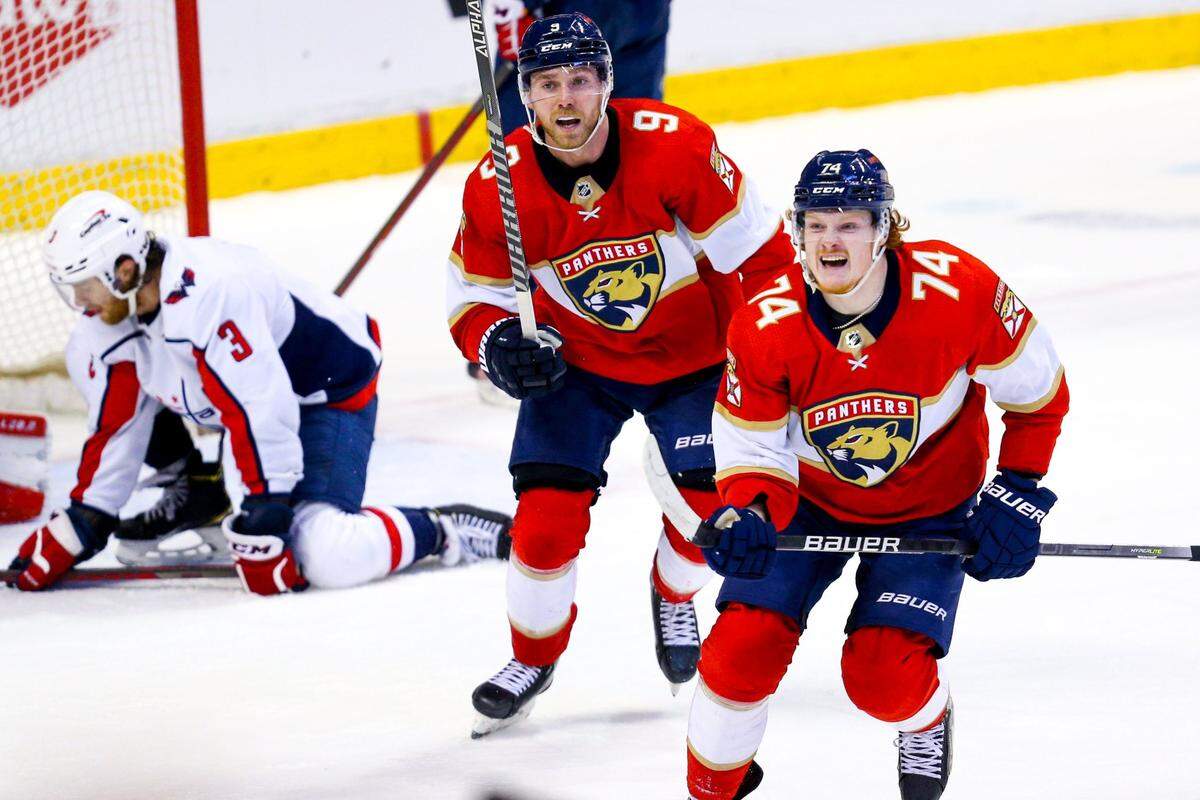 Florida Panthers center Sam Bennett (9) and right wing Owen Tippett (74) react to a game-winning Sam Reinhart goal during the third period of an NHL game against the Washington Capitals at FLA Live Arena in Sunrise, Florida, on Tuesday, November 30, 2021.