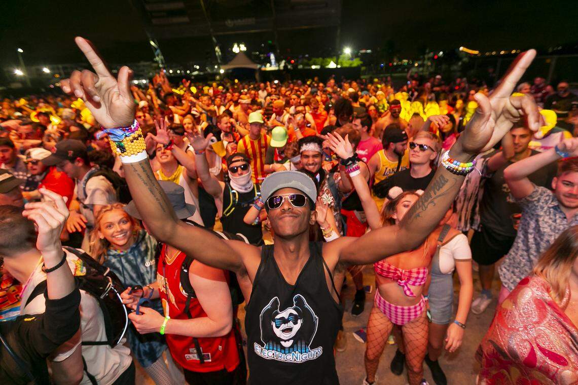 Miles Church, 26, from California, dances to the music during the 2019 Ultra Music Festival in Virginia Key, Florida, on March 29, 2019.