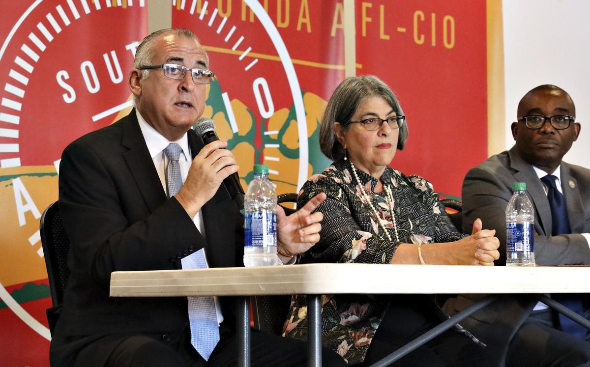 Miami-Dade mayoral candidates Esteban Bovo Jr. and Daniella Levine Cava, shown here in an October 2019 campaign event, were on opposing sides of a debate over a Democratic bill to expedite travel requests for relatives of Cuban Americans. Both are members of the County Commission, which on Nov. 19, 2019, rejected an effort by Levine Cava to endorse the bill.