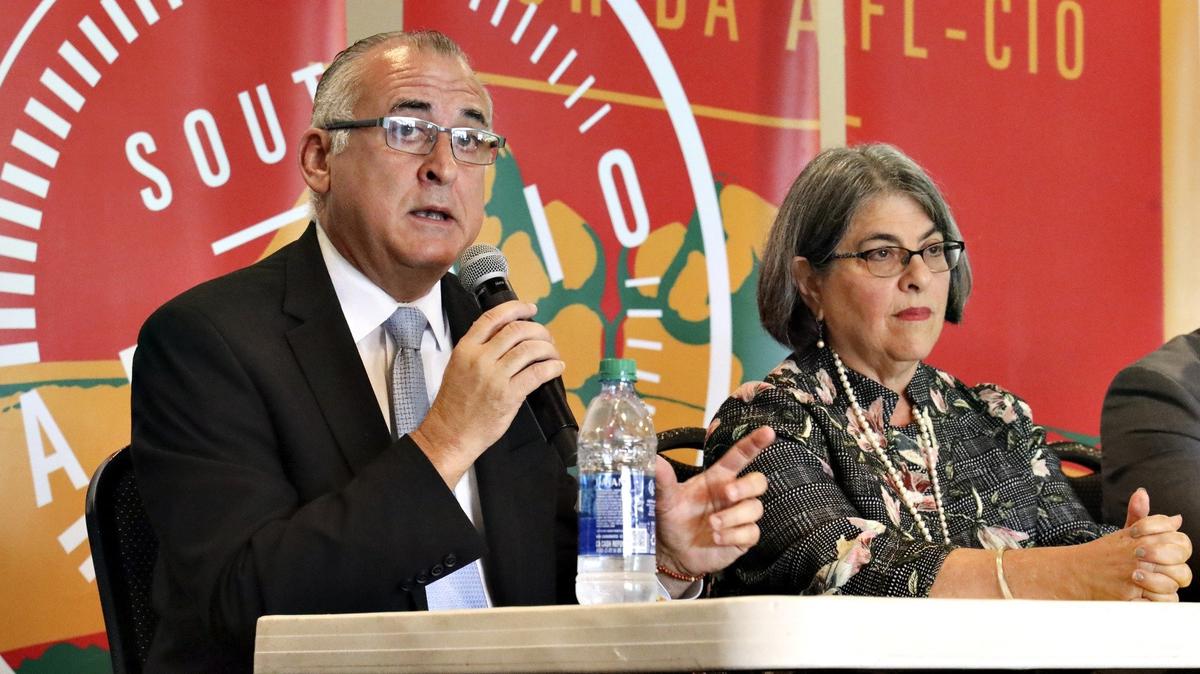 Miami-Dade mayoral candidates Esteban Bovo Jr. and Daniella Levine Cava, shown in an October 2019 campaign event, were on opposing sides of a debate over a Democratic bill to expedite travel requests for relatives of Cuban Americans. Both are members of the County Commission, which on Nov. 19, 2019, rejected an effort by Levine Cava to endorse the bill.