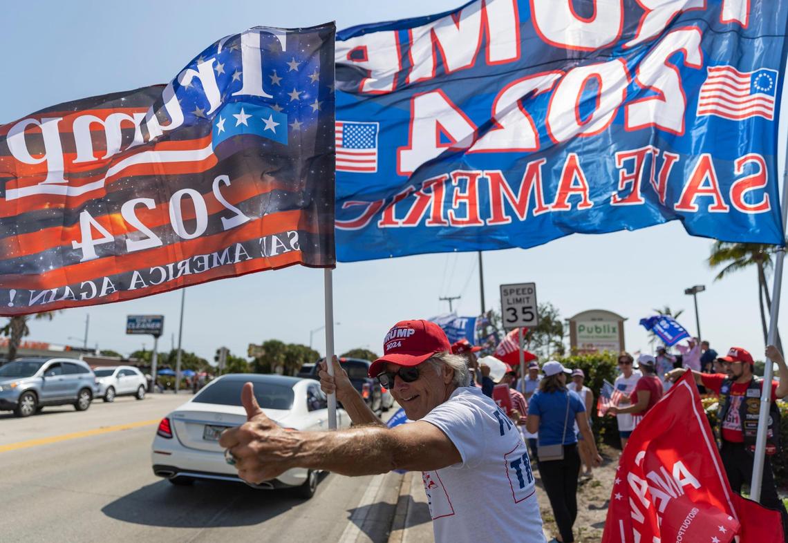 Doug Grove reacts at a rally before former President Donald Trump’s motorcade makes its way to Palm Beach International Airport in West Palm Beach, Florida, on Monday, April 3, 2023.