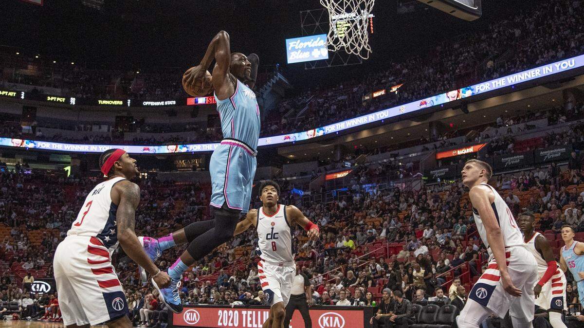 Miami Heat center Bam Adebayo (13) on a layup in the first quarter as the Miami Heat host the Washington Wizards at the AmericanAirlines Arena in Miami on Friday, December 6, 2019.